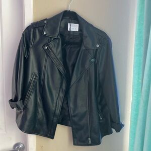 This is a Black Leather Jacket from ZARA that’s a kid size 11-12